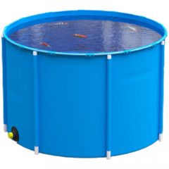 Blue 1600 litre koi carp holding tank with outlet, filled with water and koi