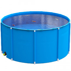 Blue 2800 litre koi carp holding tank with outlet, filled with water and koi